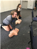 Students learning CPR