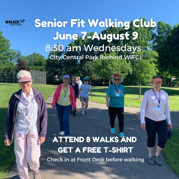 Group of women walking in a park with blue sky behind them